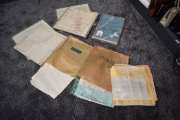 A selection of vintage table linen including three boxed Irish linen sets and similar.