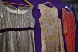 Three vintage 1960s gowns, various fabrics and styles, two in a larger size and one around a