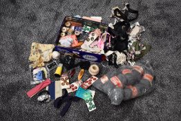 A tin full of vintage sewing items including buttons,binding, ribbon,beaded edging,thread, two