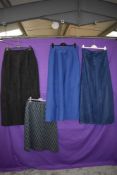 Four varied vintage skirts including 1960s black textured Jobrey skirt and sparkly blue lurex with