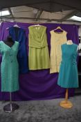 A collection of 1960s dresses and clothing including lime green linen or linen look two piece