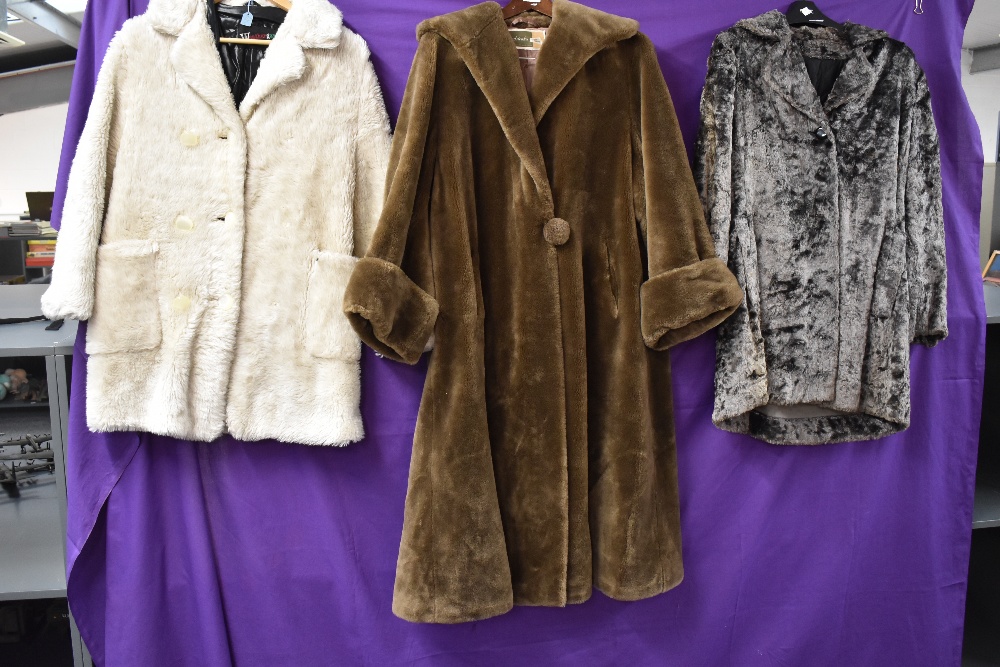 Three vintage faux fur coats.