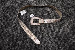 A highly collectable BB Simon studded belt in silver and pink tones.