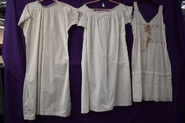 Three antique shifts /nightdresses with pretty detailing to all, ribbons replaced on one.
