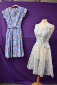 One vintage 1950s St Michaels dress in floral cotton with belt and an American 1950s sheer skirted