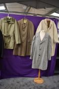 A collection of gents vintage 1960s and 70s jackets and raincoats, mixed styles and sizes.