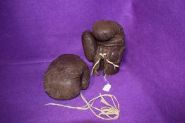 A pair of vintage leather Mitre Brand boxing gloves