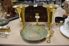 A selection of brass wares including pair of fluted vase and chamber stick