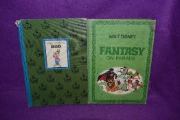 Two vintage childrens story books by Walt Disney Fantasy on parade and America