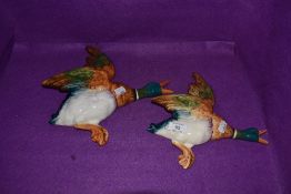 Two graduated ceramic wall mounted mallard ducks by Beswick