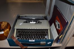 A vintage Olivetti Dora typewriter.