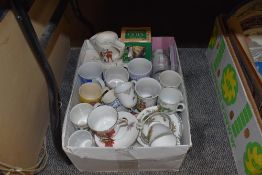 A selection of cups and mugs including shaving mug