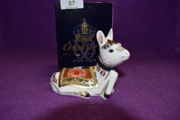 A Royal Crown Derby Paperweight Donkey Foal, boxed and with Gold stopper