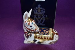 A Royal Crown Derby Paperweight Donkey, boxed and with Gold stopper