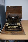 An early mechanical desktop typewriter The Royal Barlock in fine condition with original wooden