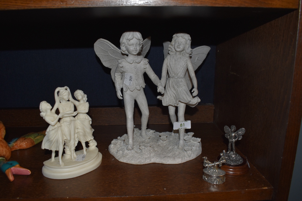 A selection of fantasy styled fairy figures and models including Past Times