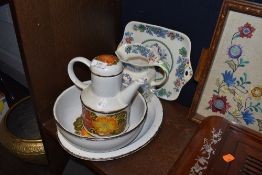 A selection of kitchen wares including Midwinter Stonehenge Autumn charger and teapot