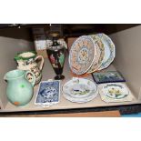 A selection of European decorated ceramics including plates and water jug