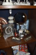 A selection of desktop items including revolving calendar and London clock company clock