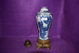 A Chinese export hard paste vase having six decorated panels with Tang style fantasy landscape
