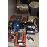 A selection of photographic equipment and cameras including Kodak and Instamaticq