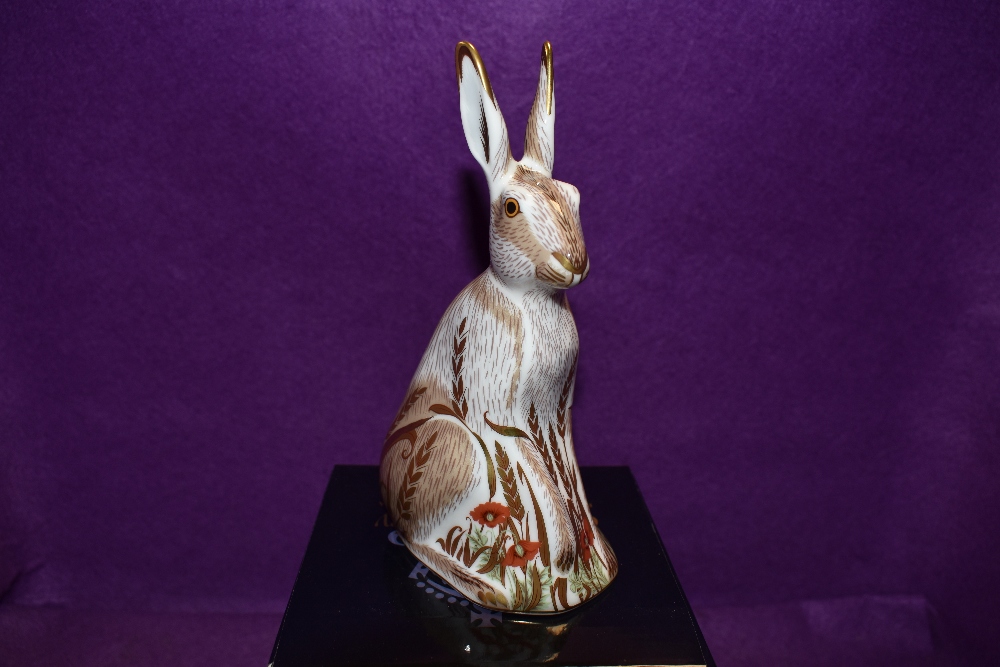 A Royal Crown Derby Paperweight Midsummer Hare, boxed and with Gold stopper