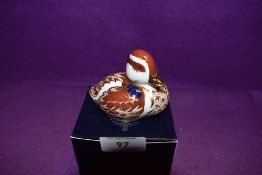 A Royal Crown Derby Paperweight Swimming Duckling, boxed and with Gold stopper