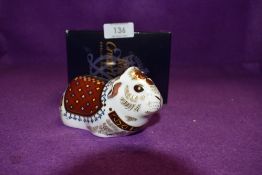 A Royal Crown Derby Paperweight Guinea Pig, boxed with Gold Stopper