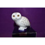 A Royal Crown Derby Paperweight Snowy Owl, boxed with Gold Stopper