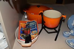 A selection of baking and cooking wares by La Creuset including large casserole and fondue