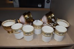 A selection of tea cup trios by Clare and Swiss Cottage coffee canisters