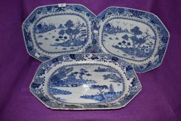 A pair of Chinese export hard paste serving dishes or chargers decorated with traditional fantasy