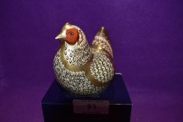 A Royal Crown Derby Paperweight Farmyard Hen limited edition 1701/5000, boxed and with Gold stopper