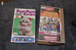 A large wooden childrens jigsaw puzzle by Condor and a pompom kitten kit