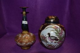 A Royal Doulton Burslem slender necked vase and similar styled ginger jar