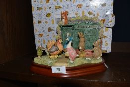 A figure base by Border Fine Arts Beatrix Potter Ginger Pickles and Peter Rabbit related with box