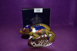 A Royal Crown Derby Paperweight Cameleon, boxed with Gold Stopper