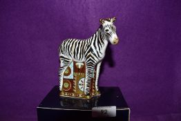 A Royal Crown Derby Paperweight Baby Zebra, boxed and with Gold stopper