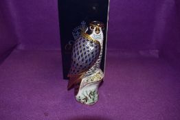 A Royal Crown Derby Paperweight Peregrine Falcon, boxed and with Gold stopper