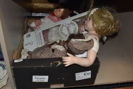 A selection of Porcelain dolls and early 20th century M Char celluloid Doll