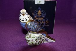 A Royal Crown Derby Paperweight Violet Budgerigar, boxed with Gold Stopper