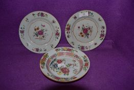 Three hard paste Japanese or Korean porcelain plates having traditional enamel decoration