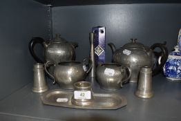 A selection of pewter wares including Culfonia teapots and water