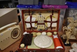 A complete almost untouched Sirram picnic set or hamper in cherry red
