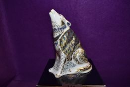 A Royal Crown Derby Paperweight Wolf, boxed and with Gold stopper