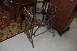 A traditional cast treadle sewing machine stand (stand only no machine or treadle)