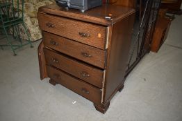 A mid 20th Century oak bedroom chest of four long drawers, dimensions approx. 75 x 44 x 90cm, good