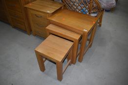 A modern golden oak nest of tables, largest table approx. 55 x 40cm