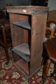 A vintage music cabinet in need of restoration