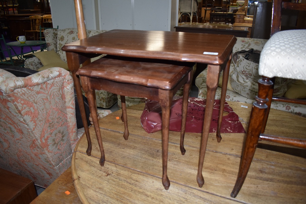 A part nest (two) of occasional tables